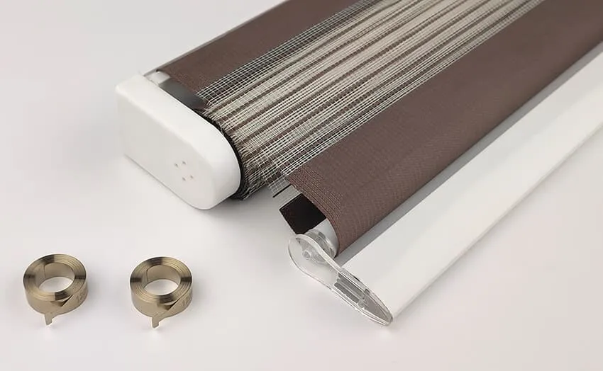 cordless window blind with constant force spring system